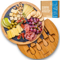 Round swivel bamboo cheese board with slate and knives