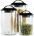 Set of three clear acrylic kitchen canisters with black lids