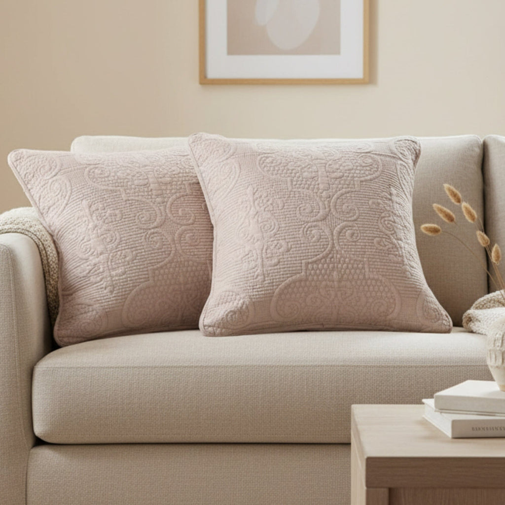 Two taupe matelasse throw pillow covers