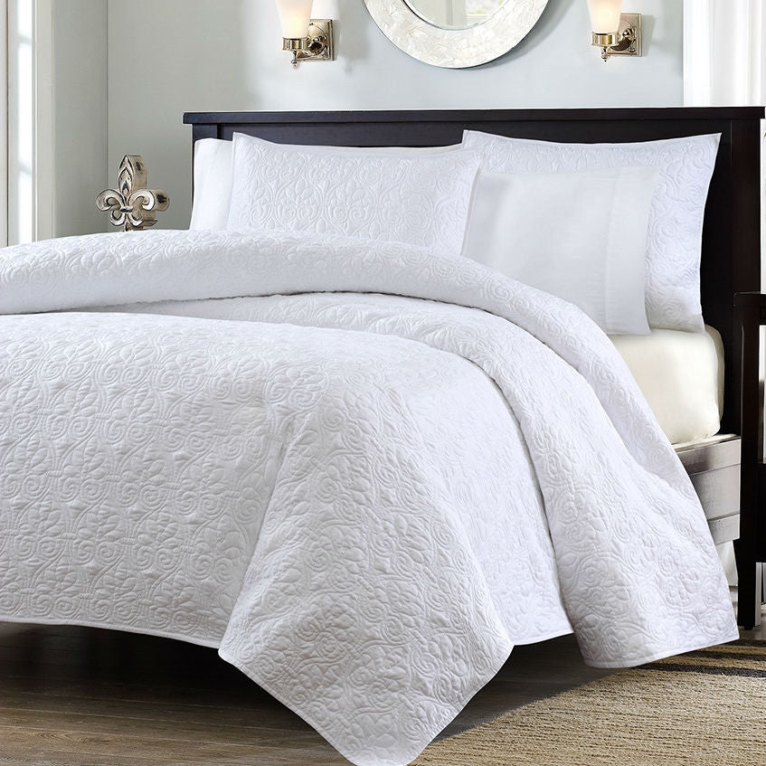 White quilted coverlet set with two shams