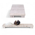 Footed travertine stone cheese serving board